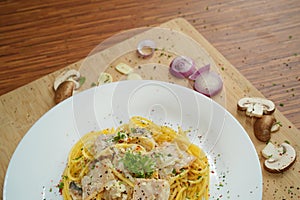 Top view of frontal hidden view of spaghetti carbonara lunch dinner meal