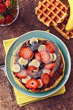 Top view fruit waffle with chocolate spread