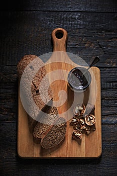 The top view of fruity jam on black wooden table