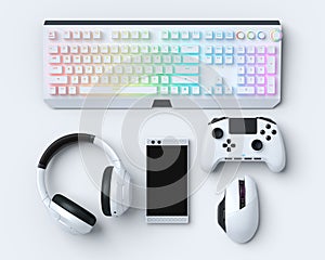 Top view gamer gears like mouse, keyboard, joystick, headphones and phone