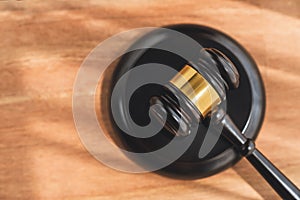 Top view gavel on wooden office desk background. equility