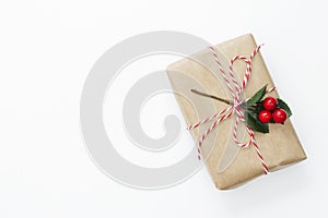 Top view gift box wraped in craft paper, isolated white background mockup copy space