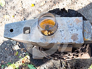 Top view of glass of brandy on outdoor anvil