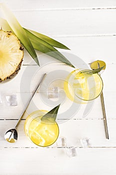 Top view of glasses with natural pineapple juice. Fresh pineapple juice full of vitamins.