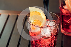 Top of view of glasses of spritz aperitif aperol cocktail with orange slices and ice cubes