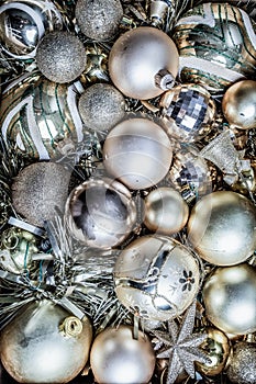 top view of golden Christmas decorations in a box