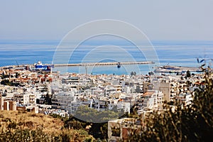 Top view of the Greek city Rethymno, harbor and Aegean Sea, Crete, Greece