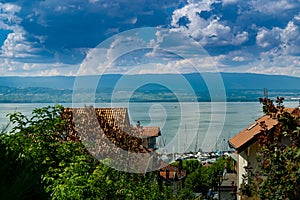 Top view of the green coast and the port of Thonon les Bains.