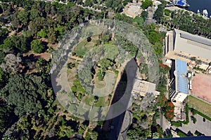 Top view of green gardens in Cairo Egypt , the shadow of the Cairo tower and the river Nile could be seen