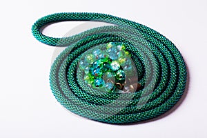 Top view green lariat chain in twisted in spiral photo