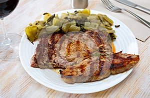 Top view on grilled beef with chard