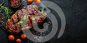 top view grilled steak with pepper herbs and tomatoes on stone black surface, flat lay with copy space, roast beef