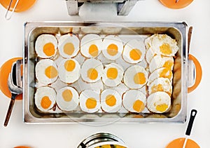 Top view, Group of Fried egg in aluminium tray