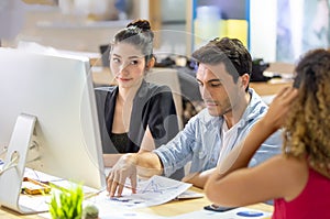 Top view of group of multiethnic busy people working in an office, Aerial view with businessman and businesswoman sitting around a