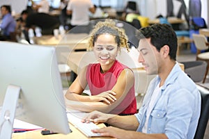 Top view of group of multiethnic busy people working in an office, Aerial view with businessman and businesswoman sitting around a