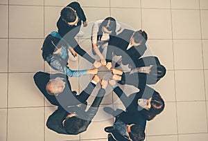 Top view. group of young professionals standing in a circle