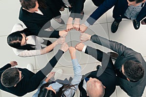 Top view. group of young professionals standing in a circle