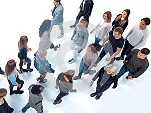 Top view . groups of young people walking in different directions