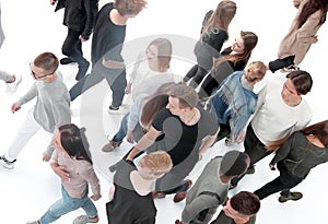 Top view . groups of young people walking in different directions