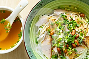 guilin rice noodles with bowl of soup nearby