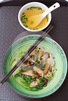 Top view guilin rice noodles with bowl of soup