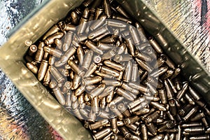 Top view of gun ammunition box. Bullets for pistol
