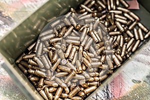 Top view of gun ammunition box. Bullets for pistol