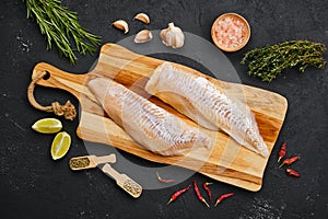 Top view of haddock fillet with seasoning