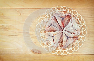 Top view of Hamantaschen cookies or hamans ears for Purim celebration (jewish holiday)