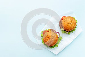 Top view of hamburgers with beef meat steak and vegetales photo