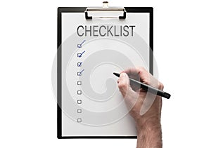 Top view of hand with pen on clipboard with checklist on white background