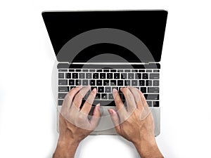 Top view of hands typing on computer laptop on white isolated background with clipping path.