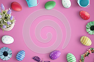 Top view of Happy Easter composition with flat lay colorful eggs and decorations