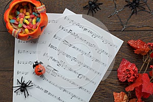 Top view of Happy Halloween Festival and music note sheet background concept.