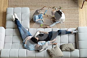 Top view of happy multiethnic family relax at home