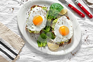 Top view healthy avocado toasts breakfast lunch avocado toast fried eggs white background