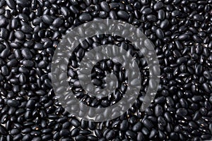 Top view of healthy grains black beans surface