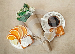 Top View.Healthy Organic Breakfast.Cup og Coffee,Cut Orange,Biscuit with Cottage Cheese.Wish Card