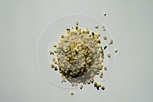 Top view of heap of yellow shelled hemp seeds