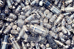 Top view heap of old glass vacuum radio tubes