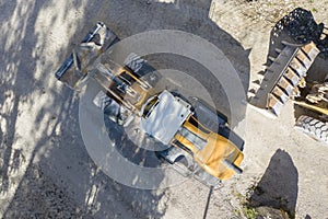 Top view of heavy wheel loaded top loader digger