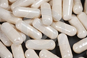 top view of herbal medicine capsule on table