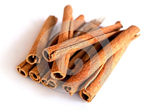 Top view of Herbs and spices with cinnamon roll sticks isolated on white backgeound.