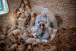 top view of hijab woman craftswoman water hyacinth weaving handicrafts