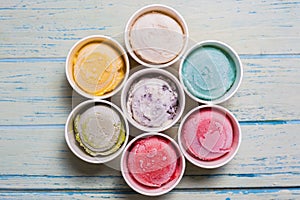 Top view Ice cream flavors in cup on blackground