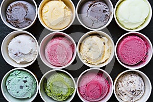 Top view Ice cream flavors in cup on blackground