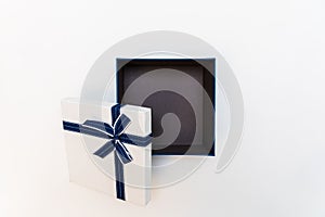 Top view image of Blue and white romantic gift box with ribbon on top