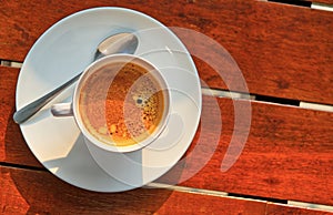 Top view image of coffee in white cup