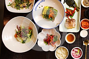 Top view image of Korean traditional full course set meal with a lot of vegetable side dishes