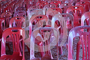 Top view image, red plastic chairs arranged in the meeting room